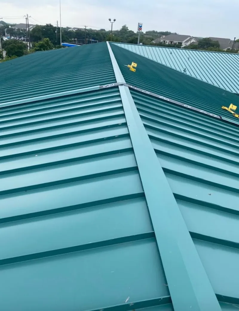 Green commercial metal roof ridge and valley for Metal Roof Repair in Four Corners